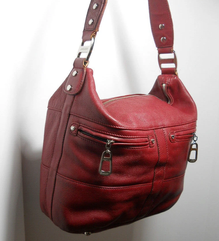 Amplio bolso de mano Jaeger vintage de cuero granulado rojo con cremallera - dos partes delanteras Foto 1 de 4