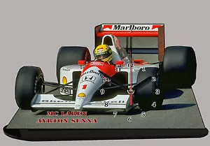 MODELLAUTOS, FORMULA ONE, F1, AYRTON SENNA, MCCLAREN-01 mit Uhr - Bild 1 von 1