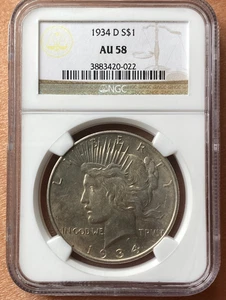 1934 D $1 NGC AU58 Peace Silver Dollar - Picture 1 of 6