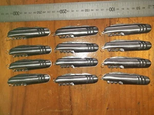 12x Llaveros Acero Inoxidable Multitool 5 Multiherramienta Cuchillo Sacacorchos Abridor de Latas - Imagen 1 de 6