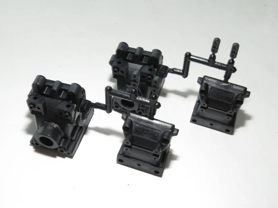 KYO34116 KYOSHO INFERNO MP10E TKI2 BUGGY FRONT REAR DIFF GEARBOX BULKHEADS CASES - Image 1 of 1