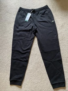 Pantalones de chándal para hombre Lacoste negros calce cónico de vellón nuevos con etiquetas talla grande - Imagen 1 de 10
