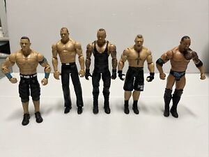 WWE  Mattel Basic Action Figure Lot Of 5 Stone Cold The Rock Undertaker Kane