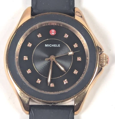 Reloj para mujer Michele analógico 40 mm con capa de silicona negro/dorado MWW27A000020 Foto 1 de 4