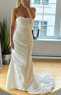 Strapless memaid wedding dress  with train.   Modern yet classic bridal gown. - Image 1 of 4