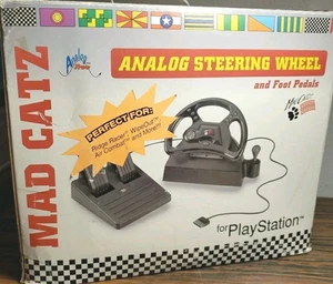 Volante y pedales analógicos MAD CATZ para PLAYSTATION, 1995 - Imagen 1 de 4