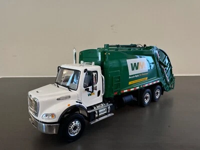 1/34 DCP/ First Gear- Freightliner M-2 Rear Loader (Waste Management) w/ Bins - Image 1 of 4