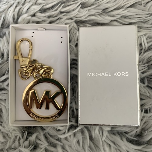Ciondolo portachiavi Michael Kors tono oro logo MK borsa circolare NUOVO