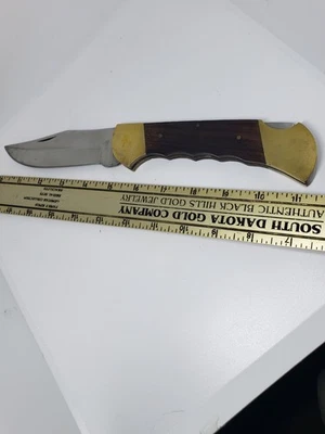  Cuchillo de hoja de bloqueo de acero inoxidable con mango de madera - sin bamboleo - Pakistán - hoja de 5". Foto 1 de 4