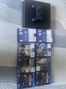 Sony PlayStation 4 Slim 500gb with 8 games