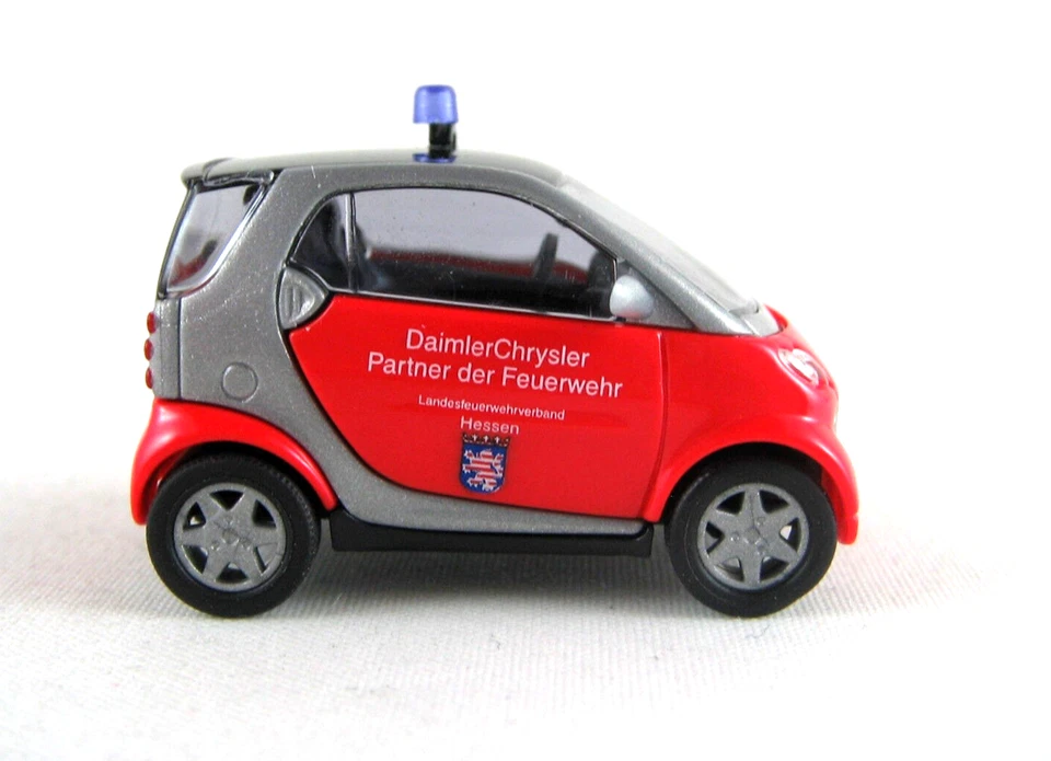 Busch 489312 Smart City Coupe Pompiere Saarland HO 1 87 NUOVO