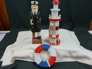 Vintage hand carved sea captain-lighthouse-life preserver figurines - Picture 1 of 8