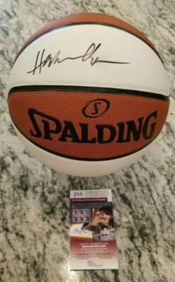 HOF'ER HAKEEM OLAJUWON AUTOGRAPH SPALDING NBA BASKETBALL JSA HOUSTON ROCKETS - Image 1 of 4