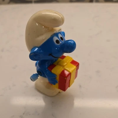 VTG 1982 Smurf Wind-up Toy - Jokey Holding Present Galoob - Image 1 of 4