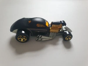HOT WHEELS 1:64 HOLIDAY HOT ROD BLACK AND GOLD 1/4 MILE COUPE W3106 - Bild 1 von 4