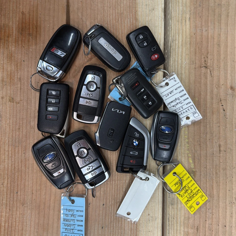 11 Used Oem Key Fobs - Image 1 of 1