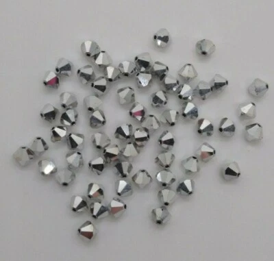 24pc Swarovski Crystal Comet Argent Light CAL 2X 5mm Bicone Beads; Metal Silver - Image 1 of 2
