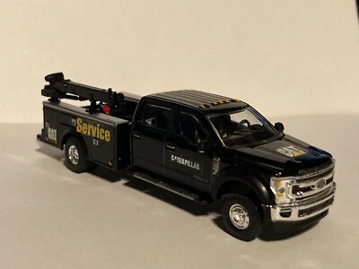 Camión de servicio Ford F-450 Super Duty CAT/Caterpillar personalizado 1/64 - negro Foto 1 de 4