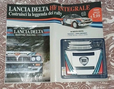 PRIMA USCITA FASCICOLO COMPONENTI LANCIA DELTA HF INTEGRALE HACHETTE SCALA 1:8 - Immagine 1 di 4