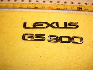 Lexus GS300 sedan 2000 REAR Trunk Lid BRONZE plastic Lexus OEM 2 Emblems Only,00 - Picture 1 of 12
