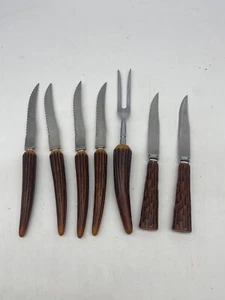 7 coltelli da bistecca dentellati vintage finti corna-bachelite forchetta intaglio Sheffield Regent - Foto 1 di 6