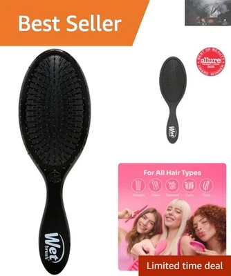 Cepillo desenredante IntelliFlex en negro - 55% menos rotura garantizada Foto 1 de 4