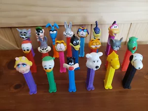 20 Various Loose Pez Dispensers New 1996 - Garfield Snoopy Looney Tunes Muppets - Foto 1 di 5
