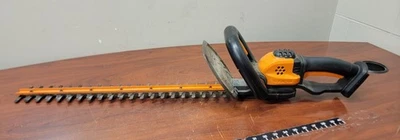 Worx Power Share 20 voltios Li-Ion 22 pulgadas Cortasetos eléctrico inalámbrico 3/4 pulgadas Foto 1 de 4