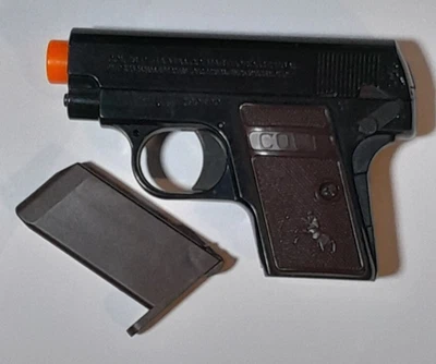 Pistola de airsoft Colt Automatic 25 modelo 199809 testada funciona - Imagem 1 de 3