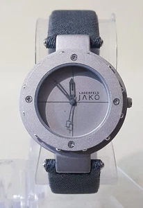 Orologio Vintage Jako Lagerfeld Cassa Argento Cinturino Pelle Grigio Nuovo BATTERIA - Foto 1 di 8