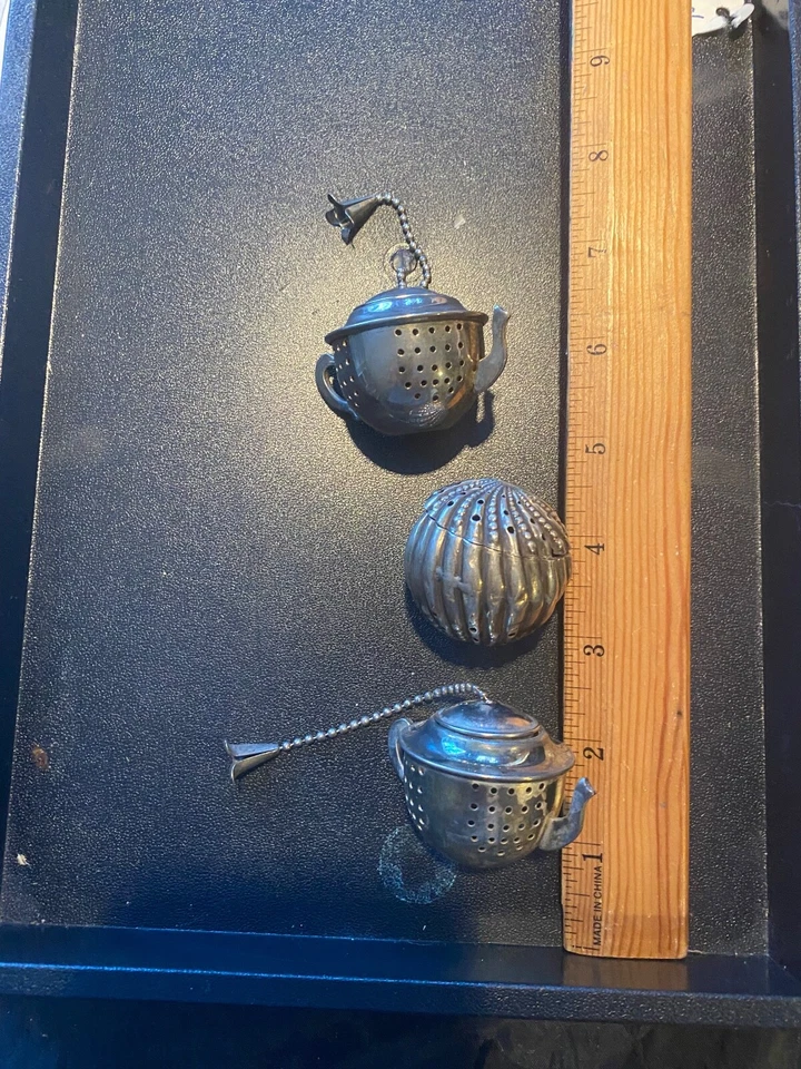 3  TEA BALL INFUSERS FROM A COLLECTION OF ODD SERVERS IN. NOT STERLING BUT   S/P - Image 1 of 1