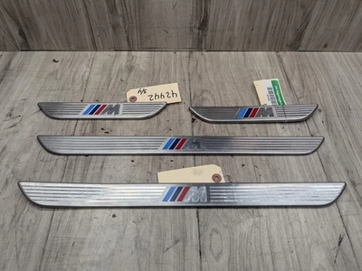 06-14 OEM BMW E70 E71 X5 X6 X5M M Cubierta de umbral de puerta delantera trasera Juego de molduras de entrada Foto 1 de 3