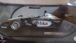 HW50198 Hot Wheels McLaren Mercedes-Benz MP4-16 2001 Mika Hakkinen 1/18 sigilli - Foto 1 di 7