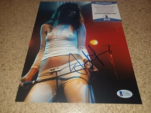 Foto firmada de Juliette Lewis 8X10 Beckett BAJO CERTIFICADO DE AUTENTICIDAD Sexy Moda Singerl Autógrafo - Imagen 1 de 5