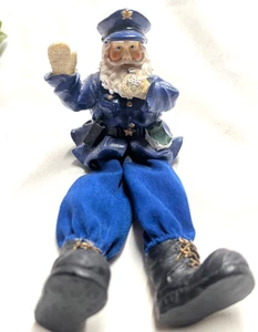 Edge sitzender Polizist Weihnachtsmann - Bild 1 von 2