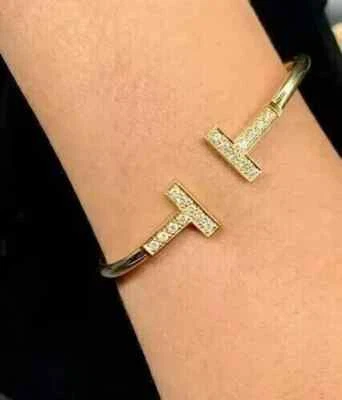 Brazalete brazalete para mujer de diamantes de corte redondo de 2 quilates creado en laboratorio enchapado en oro amarillo de 14 quilates Foto 1 de 4