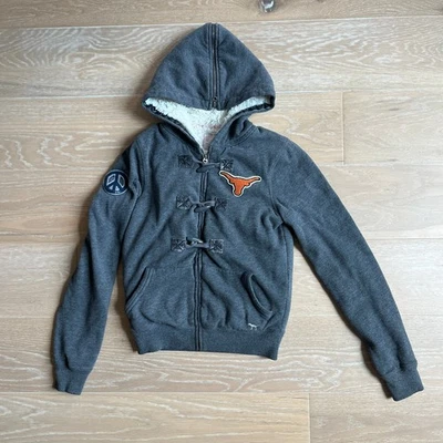 Chaqueta Victoria's Secret Rosa Colección Colegial UT Longhorns Gris Con Capucha XS Foto 1 de 4