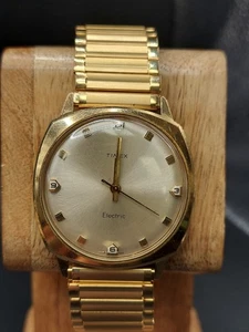 Reloj Timex Eléctrico Vintage Tono Dorado  - Imagen 1 de 11