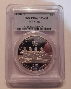 Dollaro argento commemorativo canottaggio olimpico 1996 P PR69 DCAM PCGS - Foto 1 di 2
