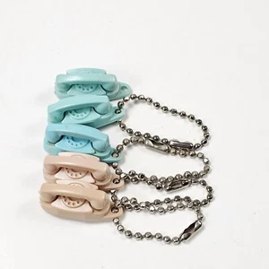 Lot Of 4 Vintage Mini The Princess Rotary Phone Keychain's Blue & Beige - Picture 1 of 6