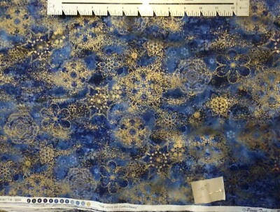 Robert Kaufman The Joy of Christmas Metallic Gold Snowflakes on Blue By the Yard - Image 1 of 2