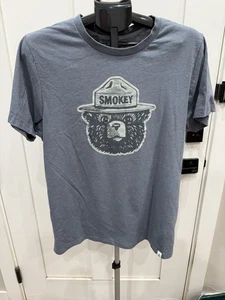 The Landmark Project Smokey The Bear Fire kurzärmliges grafisches T-Shirt Large blau - Bild 1 von 3