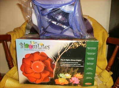 NEW SOLAR POWERED PURPLE FLOWER SPINNER AUTO SENSOR WATER RESISTANT NEW 32" H - Image 1 of 4