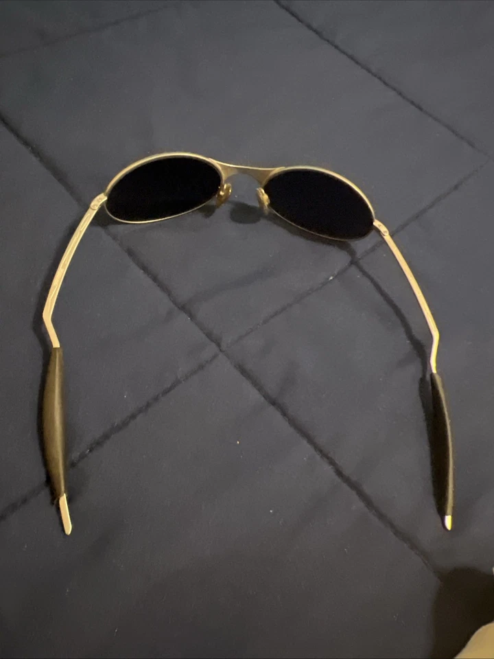 VINTAGE OAKLEY E WIRE 1ST GENERATION SILVER METAL SUNGLASSES  LENS SCRATCHED - Image 1 of 4