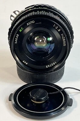 Sakar MC Auto 28mm Lens F 1:2.8 Tested Working W/ Both Lens Caps - Image 1 of 4