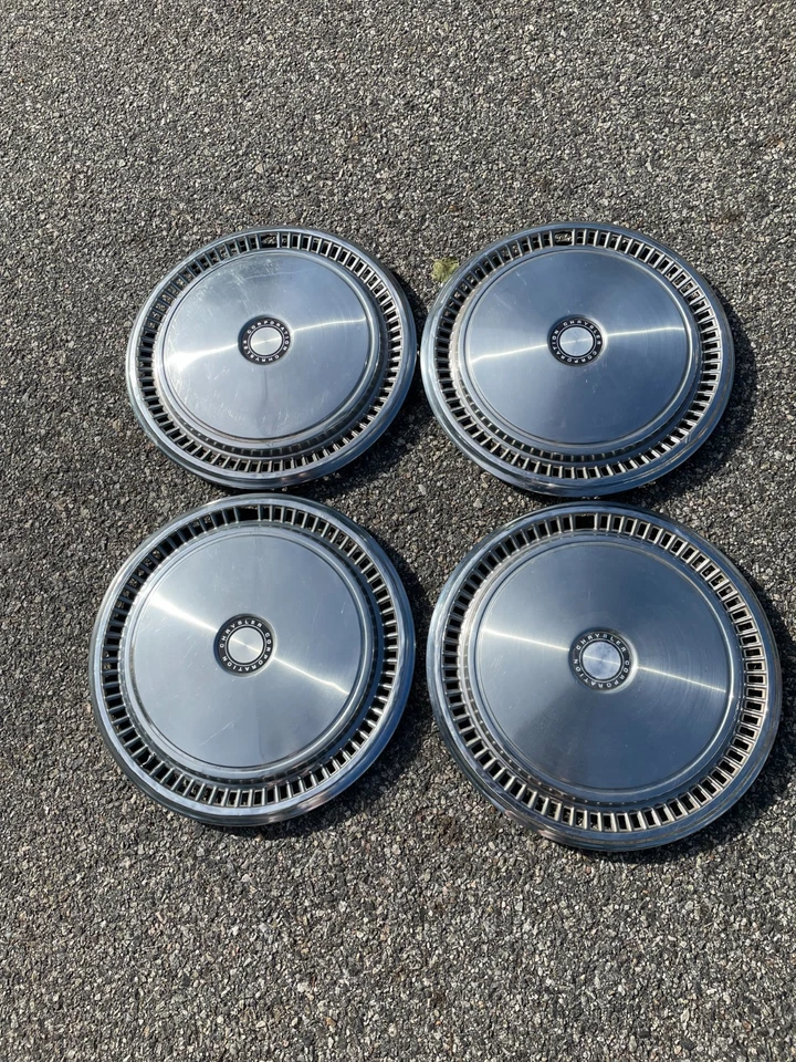 Genuine set 1979 to 1989 Dodge Diplomat D100 D150 Chrysler 15 inch hubcaps - Image 1 of 4