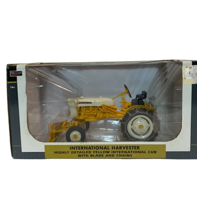 SpecCast International Harvester Cub Tractor – Yellow w/ Blade & Chains - Image 1 of 4
