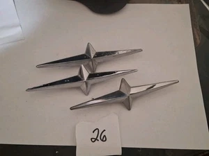LOT OF 3 VINTAGE 1957 58 PONTIAC 5 1/2" STAR EMBLEMS OEM GM 518668. - Picture 1 of 6
