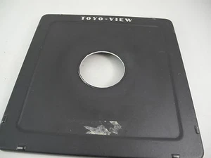 TOYO VIEW LENS BOARD METAL 6x6 WITH 1 9/16th in HOLE PERFECT USABLE TAPE RESIDUE - Picture 1 of 4