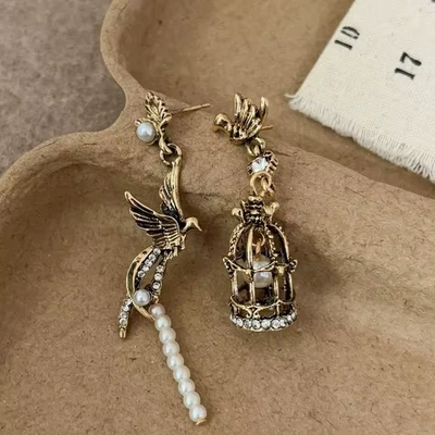 Museum Style Mismatched Earrings Bird & Birdcage Leaf Pearl CZ Antique Gold VTG - Image 1 of 4